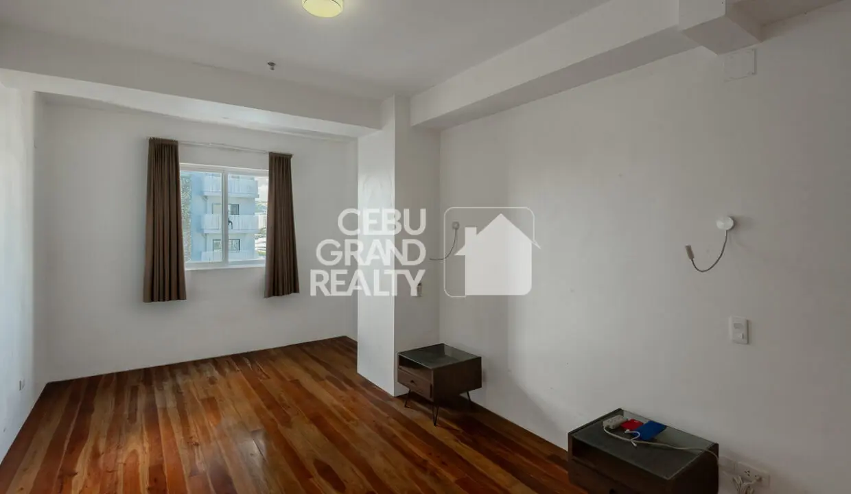 SRBQSM2 Spacious Condo with Modern Interiors in Queensland Manor - Cebu Grand Realty 6