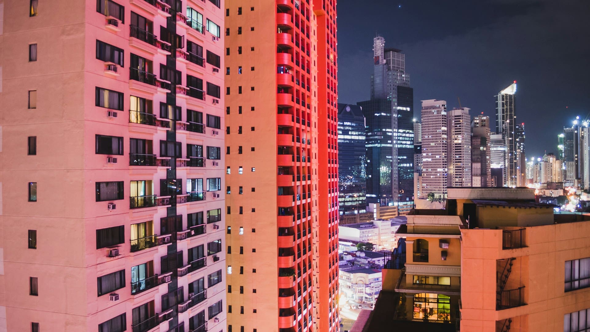 Aerial view of Philippines city buildings lit up at night