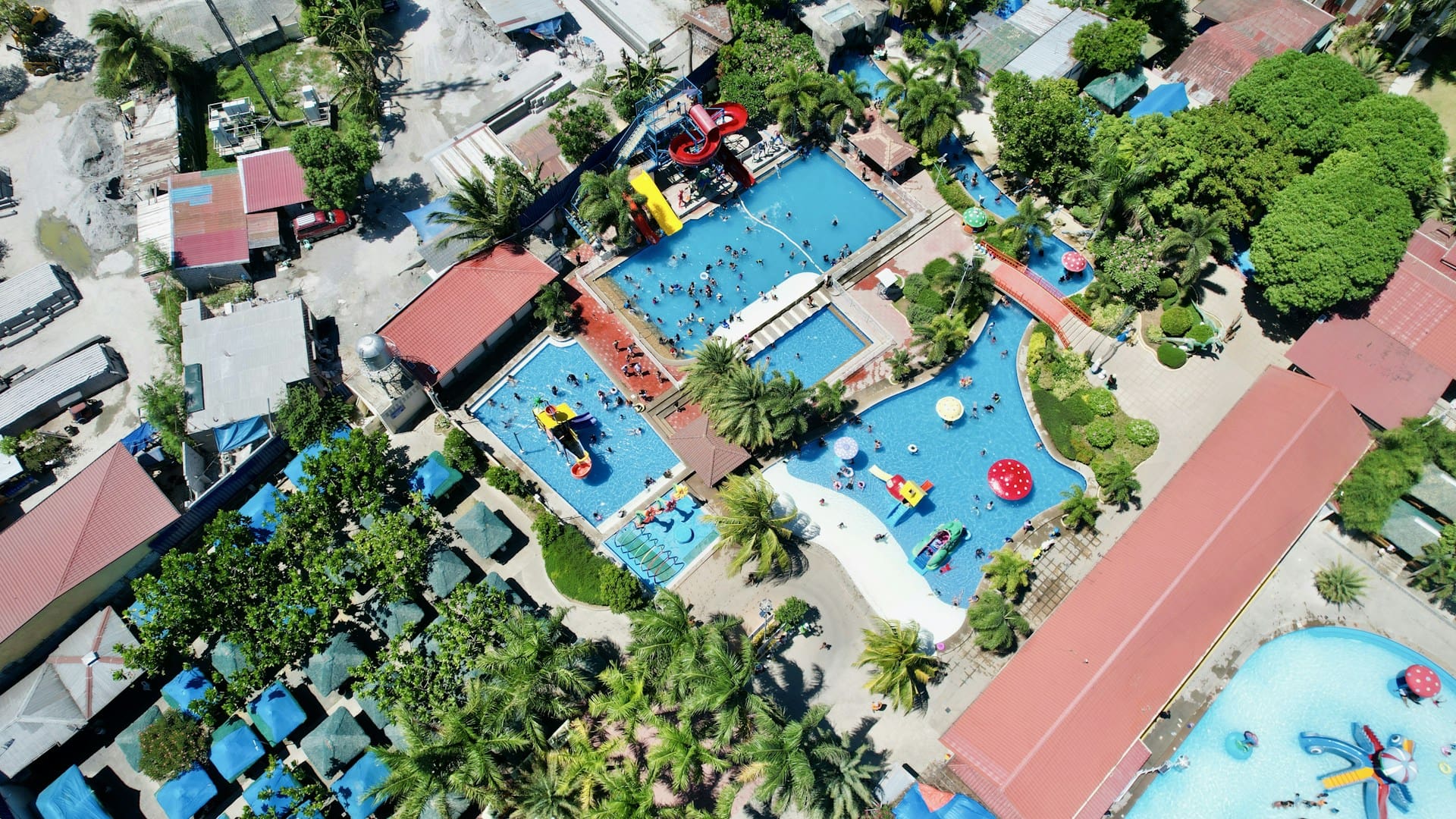Aerial view of a tropical resort swimming pool in the Philippines