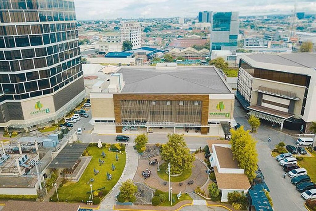 Aerial view of Oakridge Business Park showing IT Center buildings and central plaza in Mandaue City