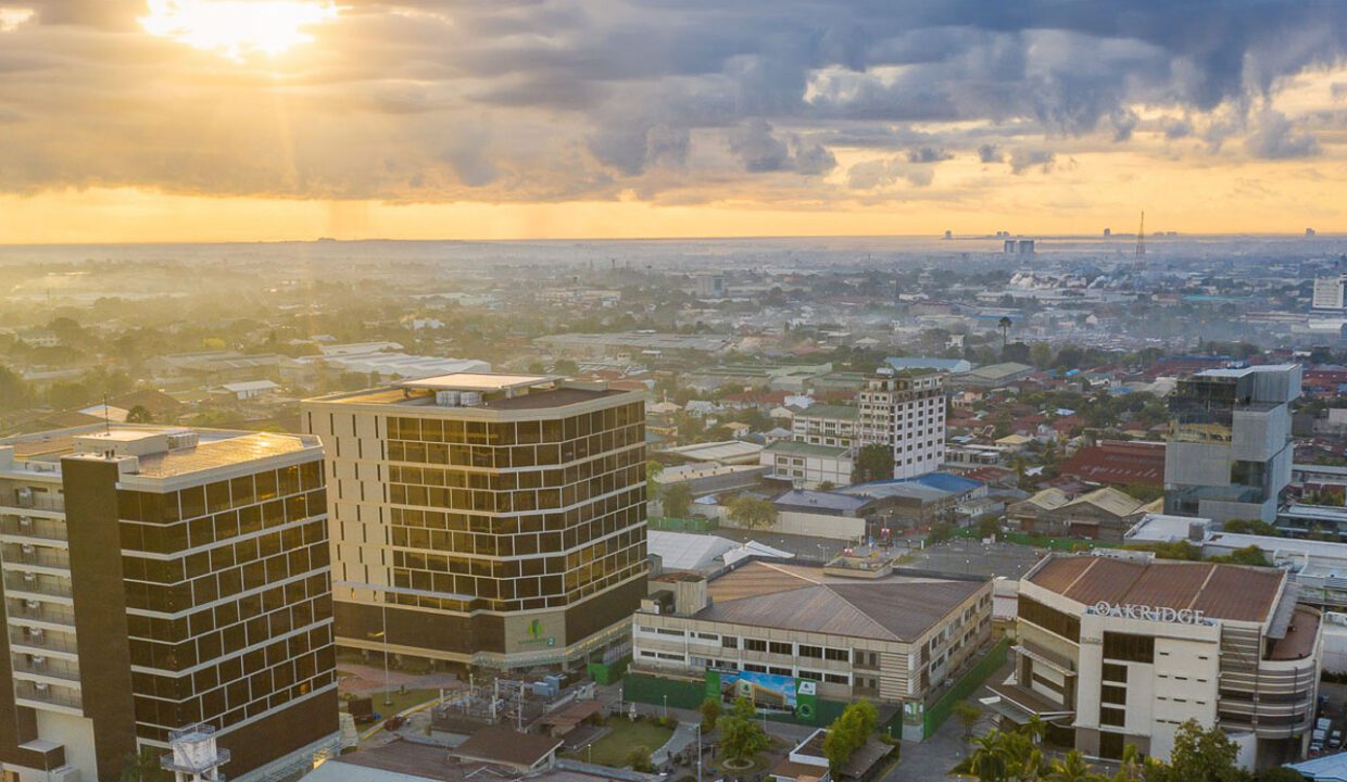 Sunset aerial view of Oakridge Business Park and surrounding Cebu City skyline