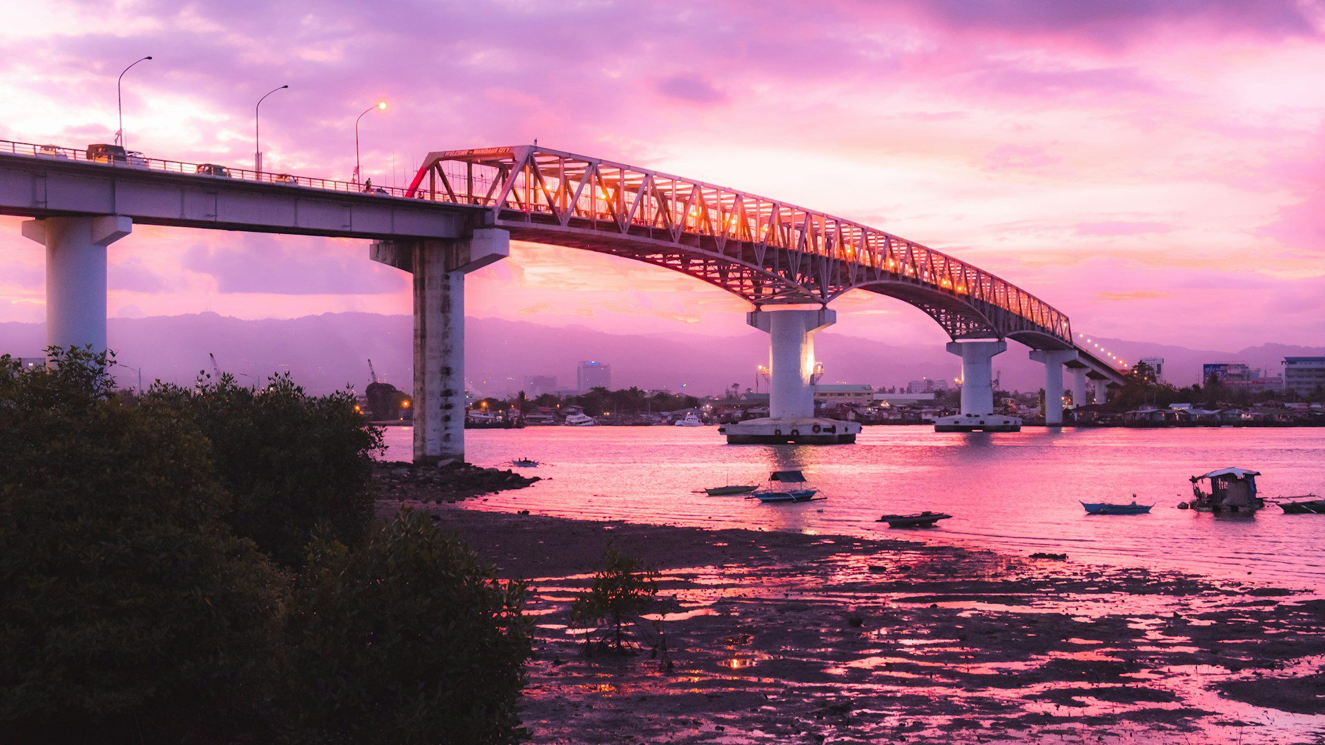 Mactan bridge at sunset connecting Mactan Island and Cebu City Philippines