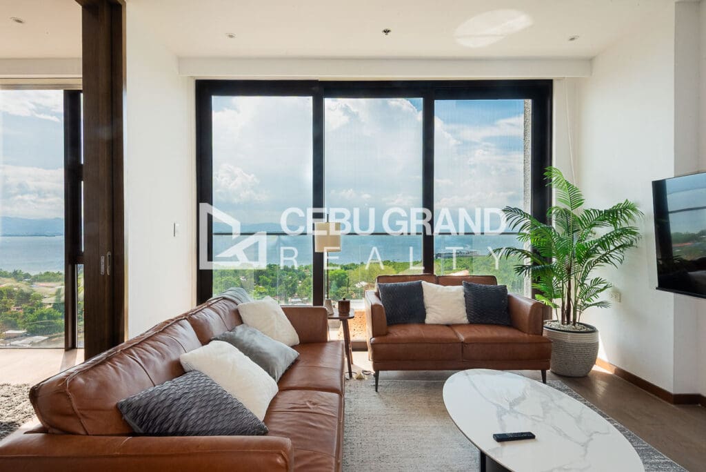 Living area of the furnished one-bedroom condo at Sheraton Residences, Mactan