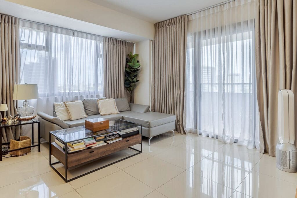 Living area of a furnished one-bedroom condominium at The Alcoves, Cebu Business Park