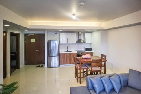 Alcoves condo for rent at Cebu Business Park — grey L-sectional living area