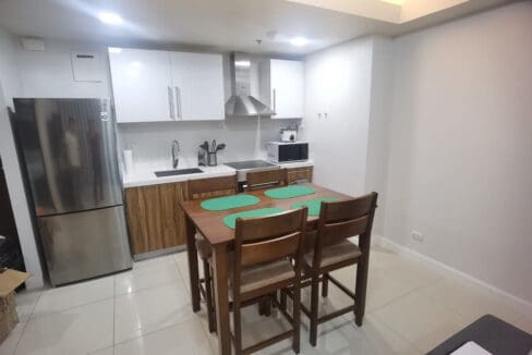 Alcoves condo for rent — modern kitchen with stainless appliances