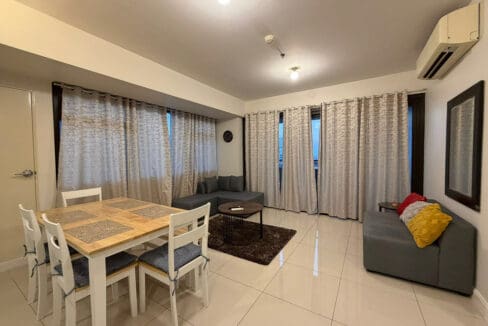 Dining set with cushioned chairs in the 1BR corner unit at The Alcoves Cebu