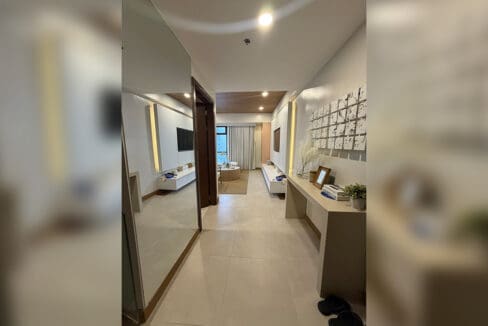 Alcoves condo for sale — formal living with floor-to-ceiling city view windows