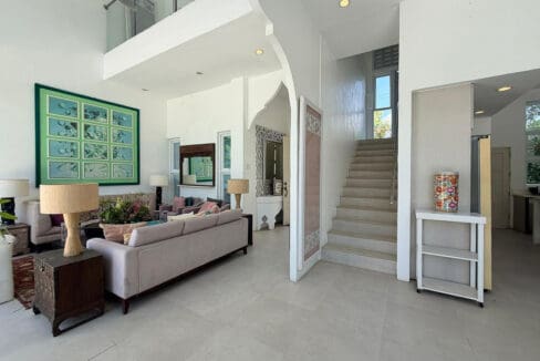 Vistamar house for sale — art-lined entry hall and lounge