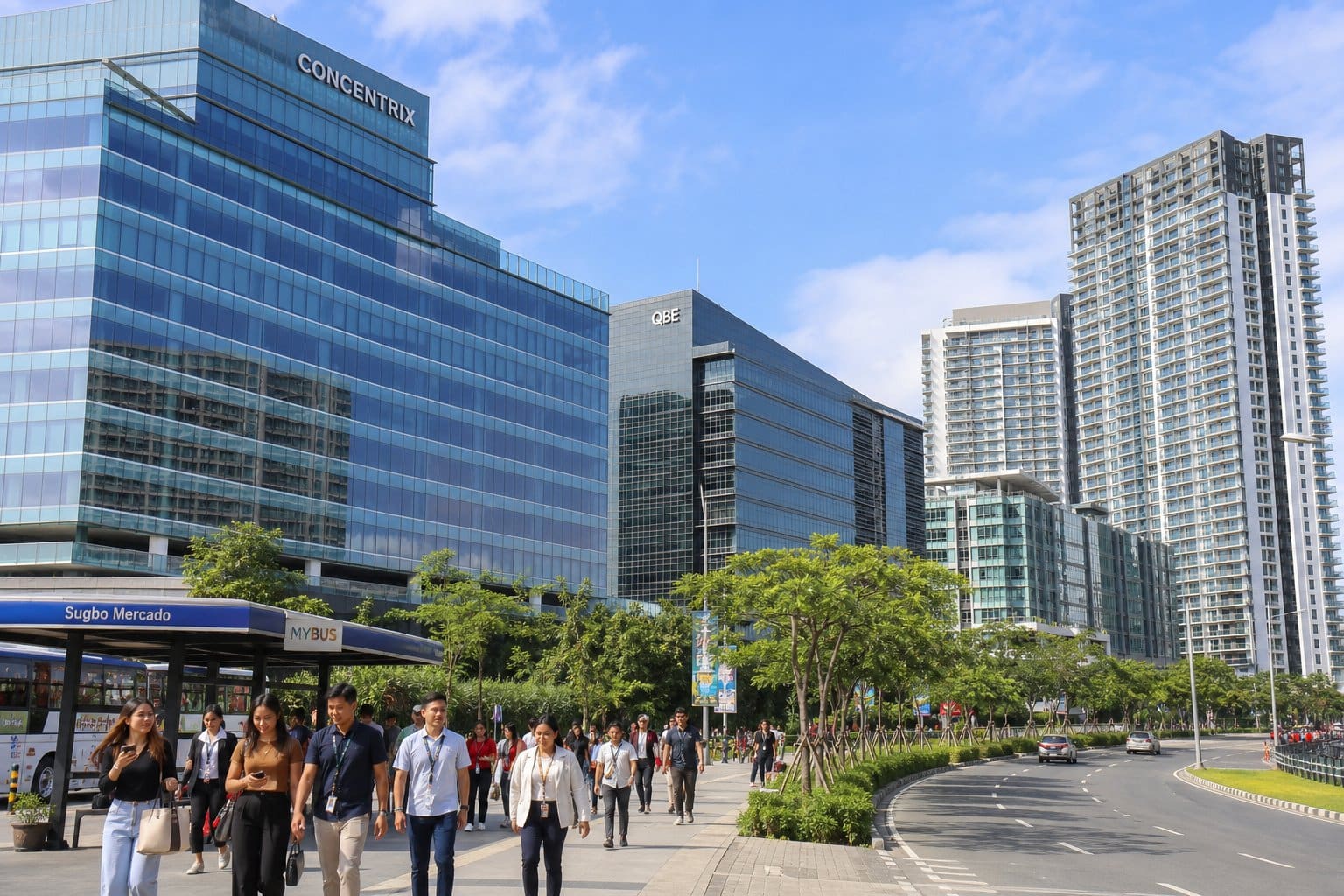 Urban scene in Metro Cebu showing office buildings, residential apartments, and people commuting near a transit stop.
