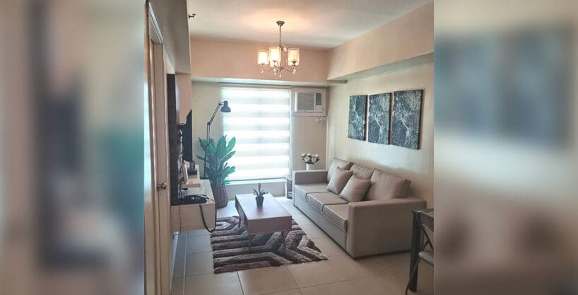 Living and dining area of a furnished 1BR condo for rent at Avida Riala Tower 2, Cebu IT Park