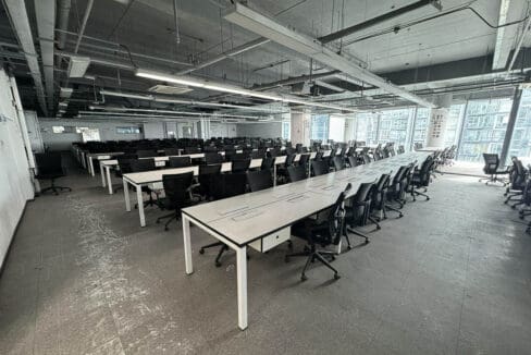 Open workstation rows and existing partitions on the fitted whole floor at the PEZA office for rent in Mactan Newtown, Lapu-Lapu