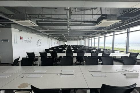 Seating area facing the sea-side glazing on the fitted whole floor at the PEZA office for rent in Mactan Newtown, Lapu-Lapu