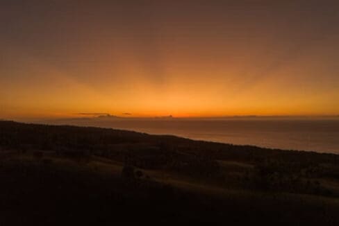 Sunset over the Bohol Sea from the hilltop resort for sale in Oslob, Cebu