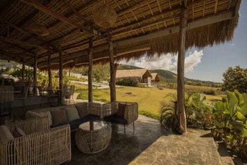 Restaurant and bar pavilion looking out to the glamping tents at the resort for sale in Oslob, Cebu