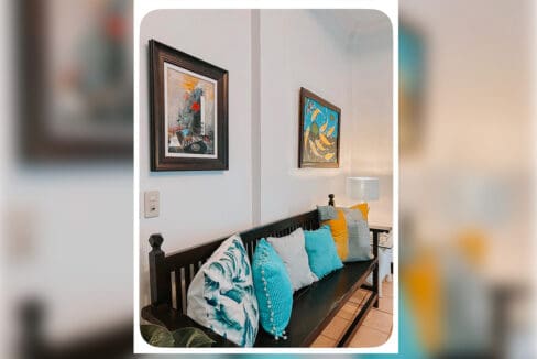 Sitting area with bench seating and cushions at the house and lot for sale in Maghaway, Talisay