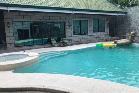 Swimming pool beside the guest house at the 6BR house and lot for sale in Maghaway, Talisay