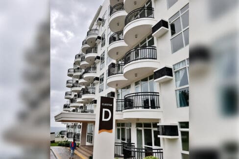 Cluster D building exterior with curved balconies at Oceanway Residences, Boracay Newcoast