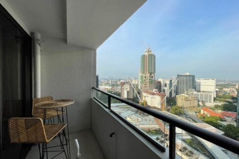 Balcony with bar stools overlooking Cebu Business Park