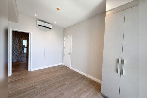 Second bedroom with fitted wardrobe and split-type aircon