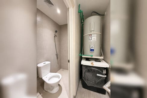 Maid room toilet and shower with water heater and washing machine