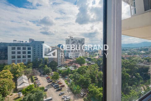 View from the 10th floor over Cebu IT Park rooftops to the city and the hills