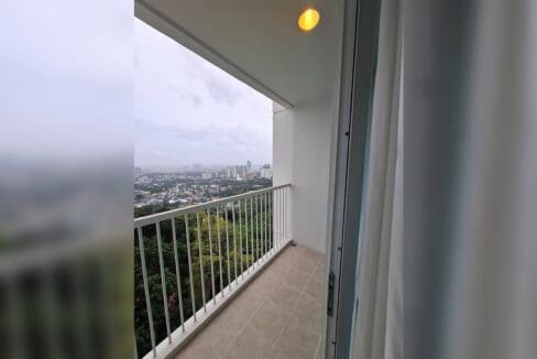 Balcony looking over the treetops to the Cebu skyline from the 10th floor.
