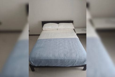 Full-size bed in the furnished studio at Galleria Residences, Tower 3, Cebu City