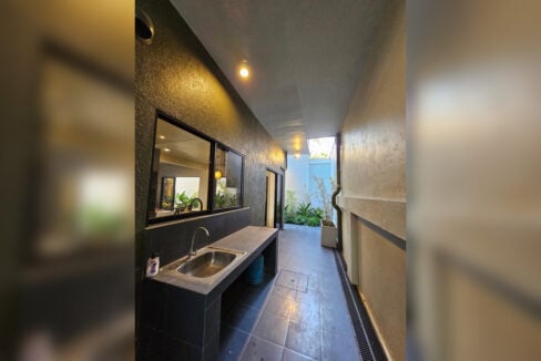 Service area with a tiled sink counter