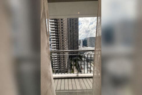 Balcony off the living area, looking across to the neighbouring Cebu Business Park towers