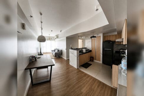 Open living, dining, and kitchen layout of the 2BR condo at Solinea Tower 3, Cebu Business Park