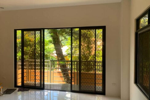 Sliding glass doors opening onto a balcony