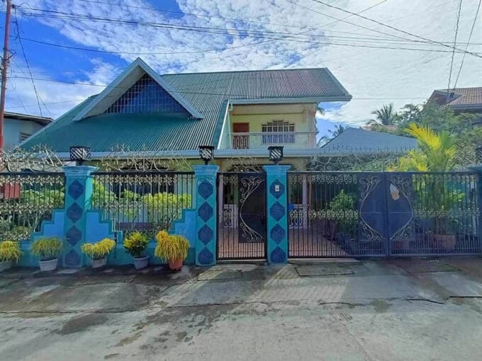 Facade of the two-storey house and lot for sale in Bohol, in Barangay Cahayag, Tubigon