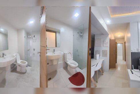 Two bathrooms with glass shower partitions and wall-hung basins, and the hallway to the bedrooms
