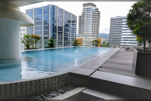Asia Premier Residences swimming pool and pool deck with Cebu IT Park towers behind