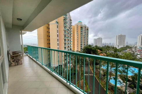Main balcony at Citylights Gardens overlooking the towers, pools and city skyline