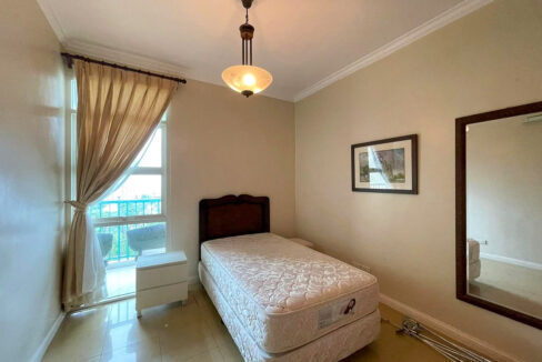 Third bedroom with a single bed, pendant light and full-height window