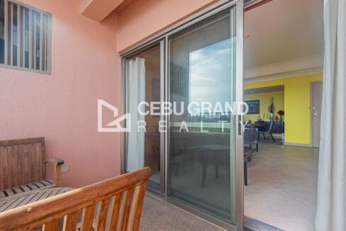 Sliding glass door from the balcony into the living and dining area