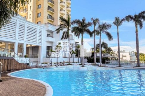 Swimming pool and residential tower at Movenpick Residences Mactan