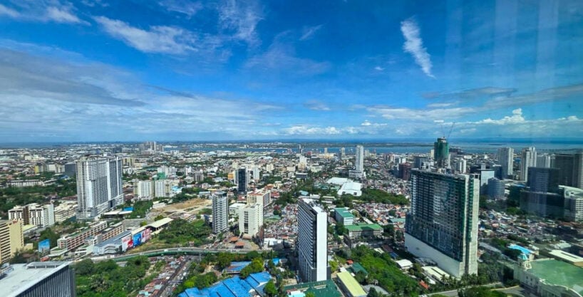 Panoramic city and sea view from a Cebu Exchange corner office for rent