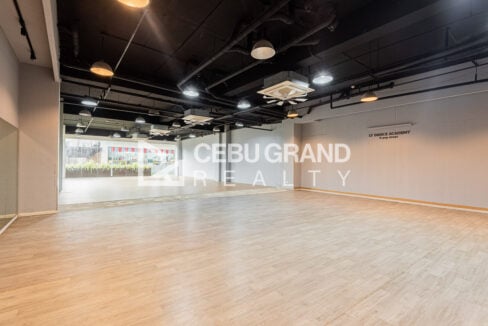 Long studio hall with glass frontage onto the inner courtyard