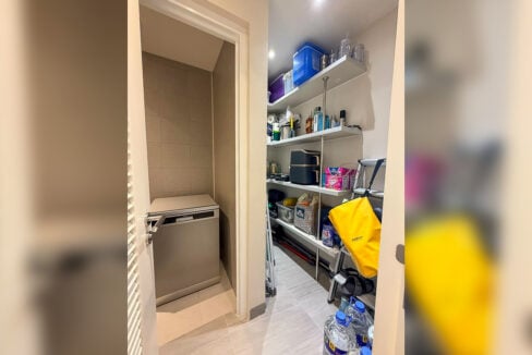 Pantry converted from the former maid’s room in this Aruga 2BR condo