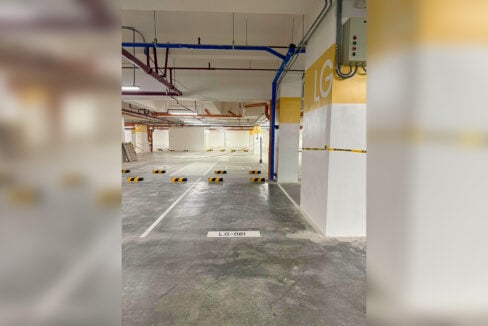 Indoor basement parking slot at Aruga Resort and Residences