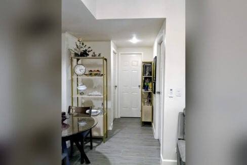 Inner hallway in the Grand Residences unit leading to the bedrooms