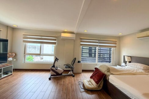Master suite with two split-type aircon units and wood-look flooring