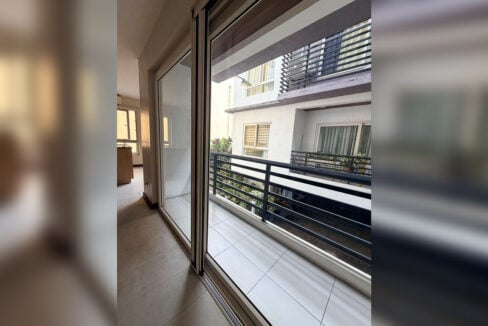 Balcony off the dining area with metal railing