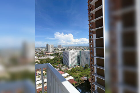 Balcony view across Mandaue toward the coast from the 20th floor