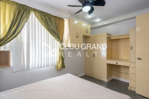 Built-in wardrobe and desk nook in the second bedroom