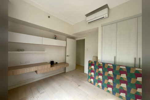 Second bedroom with a built-in desk, wall cabinets, a wardrobe and split-type aircon